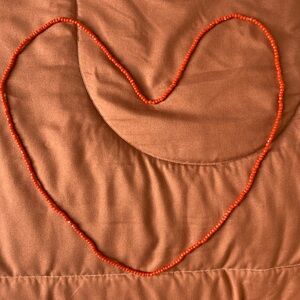 Small red waist bead